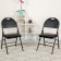 2-Pack HERCULES Series Ultra-Premium Triple Braced Black Vinyl Metal Folding Chair with Easy-Carry Handle