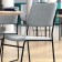 HERCULES Series 500 lb. Capacity High Density Gray Fabric Stacking Chair with Sled Base