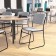 HERCULES Series 500 lb. Capacity High Density Gray Fabric Stacking Chair with Sled Base