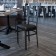HERCULES Series Black Window Back Metal Restaurant Chair - Black Vinyl Seat